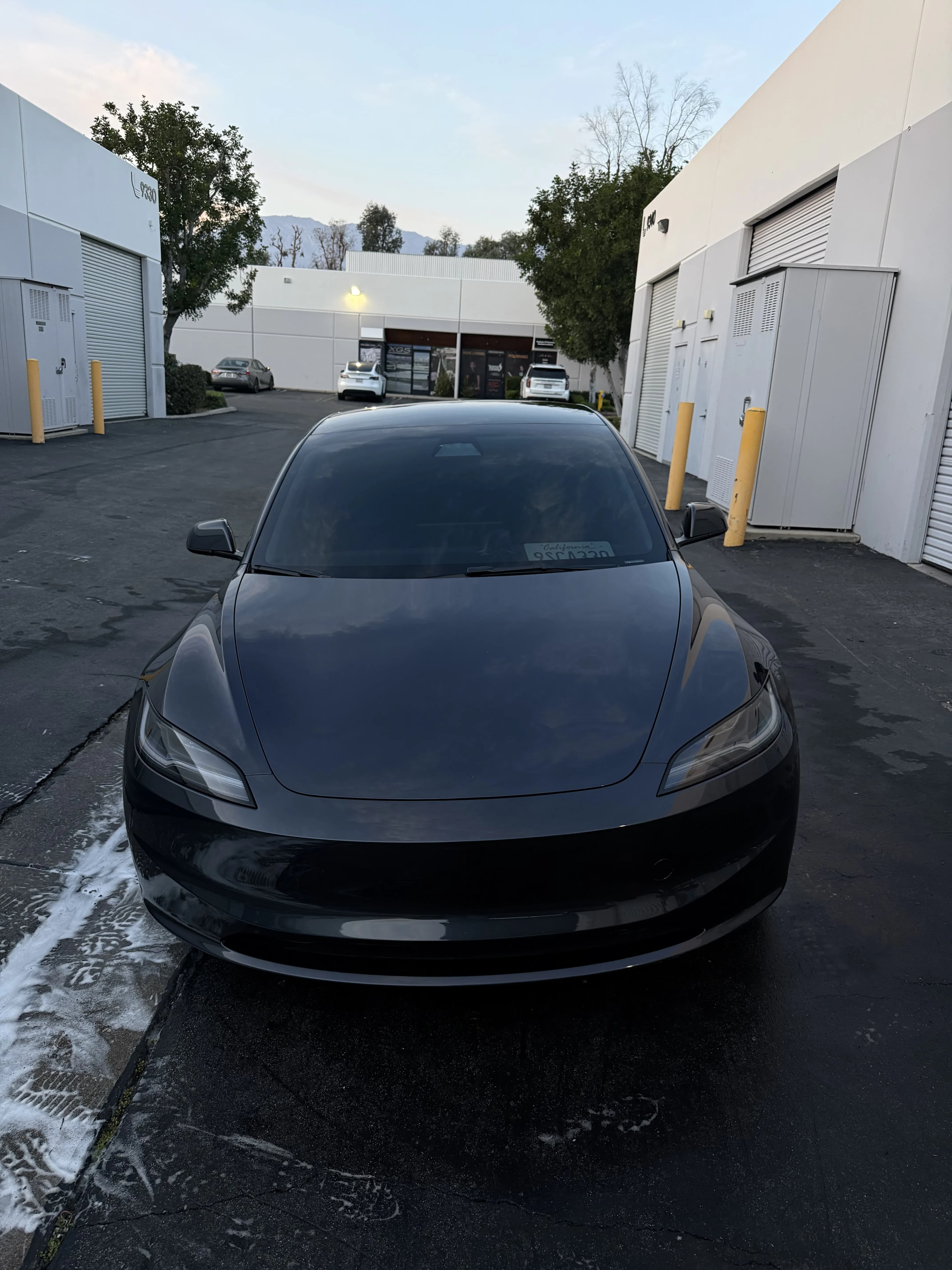 Gray Tesla Model 3 exterior wash
